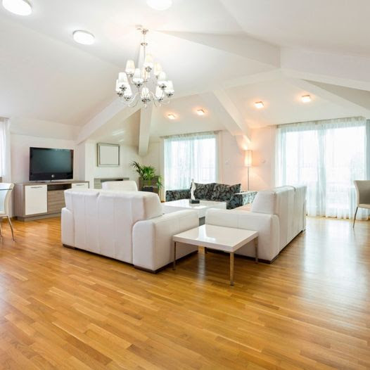 Shiny hardwood flooring in living room