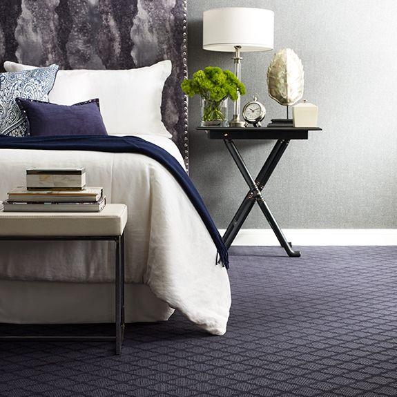 Blue carpet in bedroom